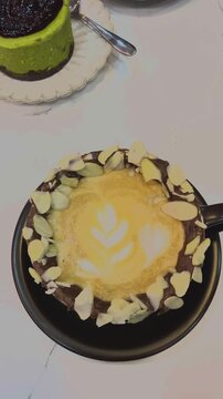 Top-Down View of Latte Art Coffee in a Cup