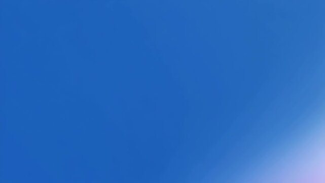 Slow pan across a vibrant linear gradient background transitioning from deep blue to soft lavender, showcasing smooth color blending and dynamic lighting