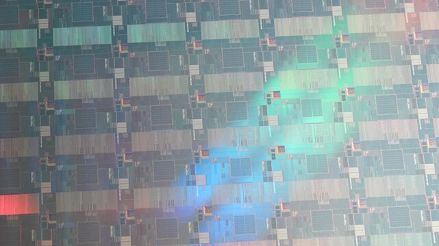 High-tech Macro Photography of a Colorful Silicon Wafer with Microchip Patterns for AI Hardware and Semiconductor Industry Concept.