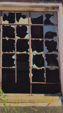 Weathered Window with Broken Panes