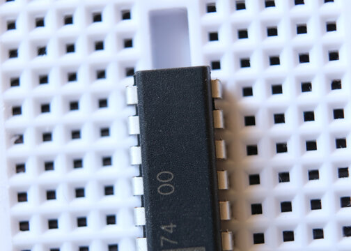 Close up of an integrated circuit on electronic protoboard 