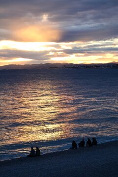 Sunset over the Mediterranean Sea at Baie des Anges in Nice, France