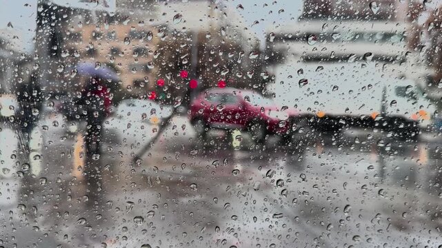 Rainy urban street and wet pavement