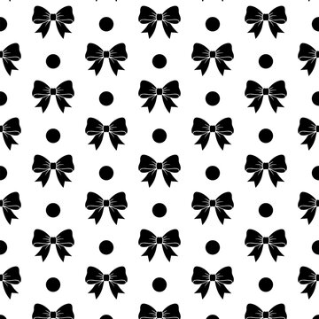 Black bows and polka dots vertical seamless pattern on white background