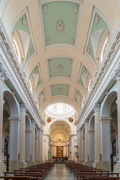 Neoclassical interior of the Urbino Cathedral with central nave and altar