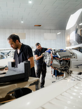 Mechanics are focused on aircraft maintenance