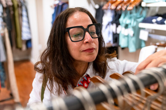 woman shopping inside clothing store