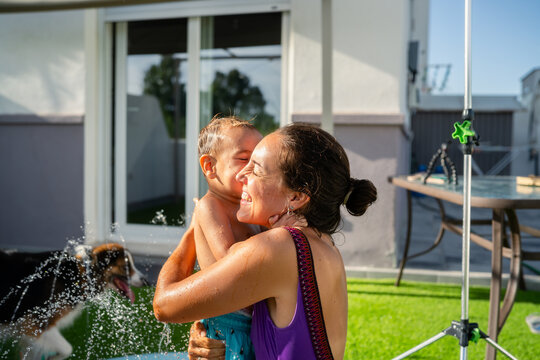 Mother and son hugging