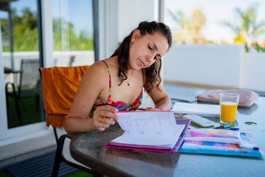 Woman planning vacation activities