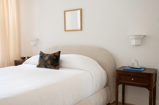 Cozy Bedroom With a Bed and Simple Decor in a Light Setting