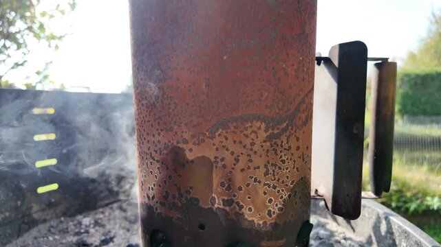 lighting a grill using a chimney starter