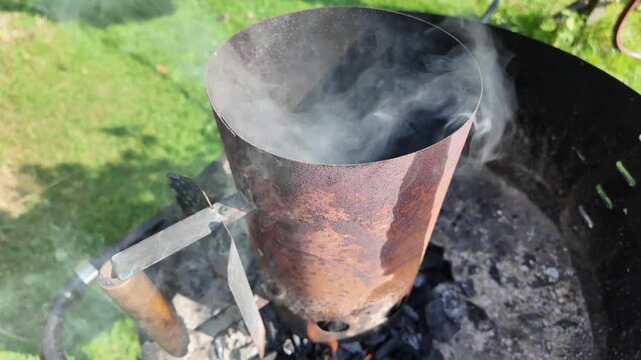lighting a grill using a chimney starter