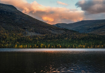 Sunset over Lake Shchuchye in Khibiny Mountains Landscape © sablinstanislav