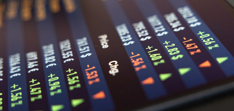 Close-up screen with ETF exchange trading funds information, prices and stock market data. Wealth, investment strategy, making money, growth.
