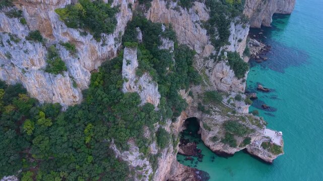 Aerial drone view of the landscape at Mount Buciero and the Faro del Caballo lighthouse in the Santo&ntilde;a, Victoria and Joyel Marshes Natural Park. Cantabrian Sea. Santo&ntilde;a. Cantabria. Spain. Europe