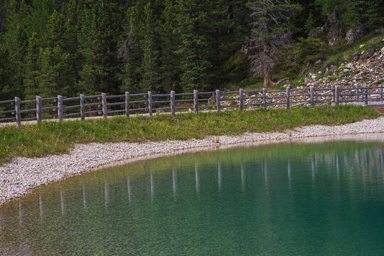 alpine lake inside val di fassa, The la Pian da mur during a summer early sunset
