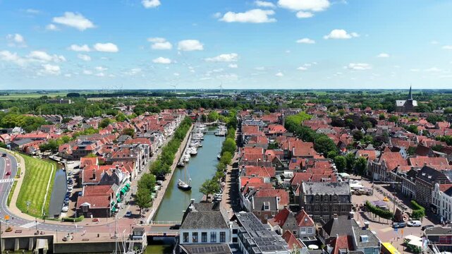 Aerial view of Harlingen with boats sailing through the canals in the Netherlands