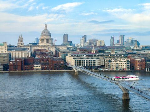 View of Millenium Bridge over the Thames and St. Paul's Cathedral, London, England, Great Britain