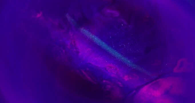 Sparkling fluid. Blur neon background. Pigment color wave spill on wet shiny fluorescent texture. Abstract violet pink paint glow gradient mix.
