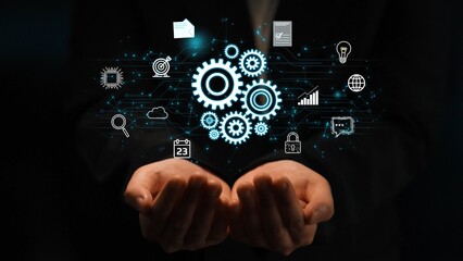 Fototapeta premium Hands Holding Gear Icons Symbolizing Technology and Innovation in a Digital World with Data, Charts, and Social Media Elements for Business Context. Entropy.