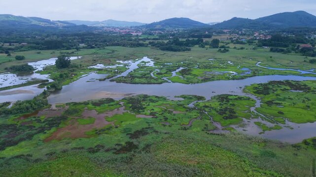 Aerial drone view of the Joyel Marshes in the Santo&ntilde;a, Victoria and Joyel Marshes Natural Park. Noja. Cantabrian Sea. Cantabria. Spain. Europe