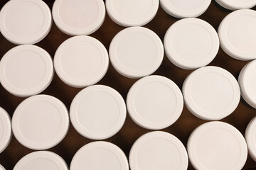 Gouache colorful paints set. Jars of gouache paint isolated on a white background. © Nikolay
