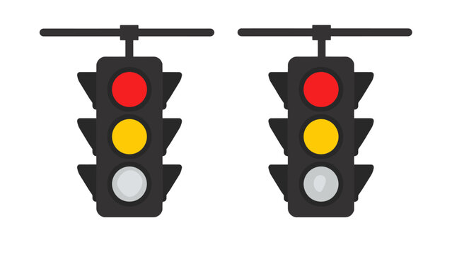 Pair of overhead traffic lights showing red and yellow signals