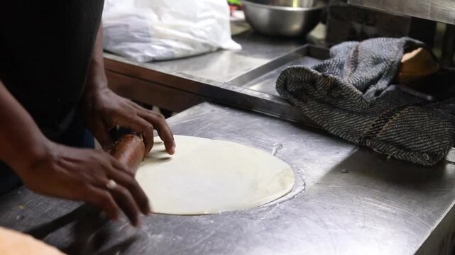 Indian street food paratha making on tawa for kebab paratha