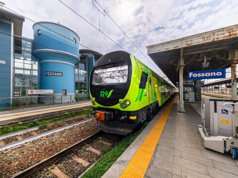 Fossano, Cuneo, Italy - september 30, 2026: Modern regional passenger train TAF (Treno Alta Frequentazione) in new green livery stopped at the platform of Fossano railway station