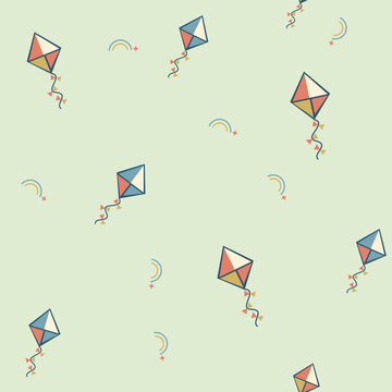 Seamless colorful kite pattern with bow tails and rainbow accents on pale green