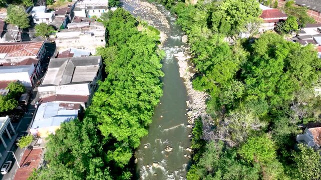 Honda City with Bridges Crossing the Magdalena River in Tolima, Colombia. Establishing Shot. Aerial View.