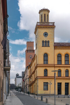 Old Town Hall in Jablonec nad Nisou, Liberec Region, Czech Republic, with its historic tower and clock beside a quiet street and surrounding city buildings.