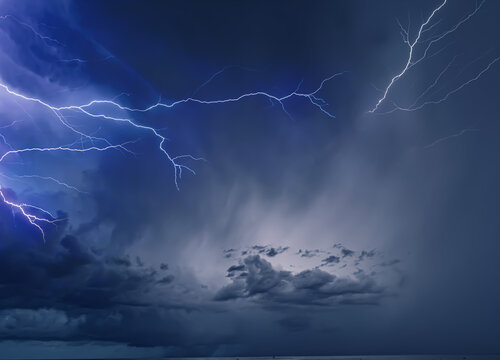 Dramatic Lightning Bolts Striking Across Dark Stormy Night Sky A stormy sky with lightning in the background