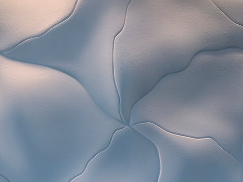 Abstract patterns on interior wall of office building lobby.