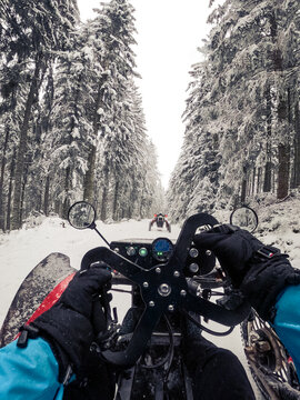 Electric off-road vehicles during a recreational outing in a snowy landscape on a winter holiday. UGC