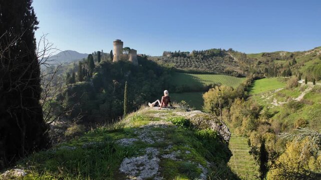 Captivating view of medieval towers in of Brisighella Castle: Rocca Manfrediana in Italy, in Tuscan romagnolo apennines. Rebuilt in the mid-1800s and features a six-hour dial clock