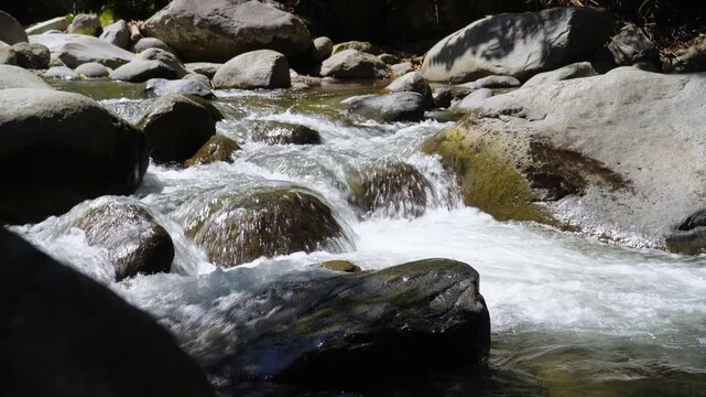 Small Cascade Over River Rocks