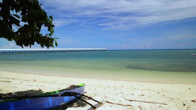 Traditional Boat on Quiet Tropical Beach