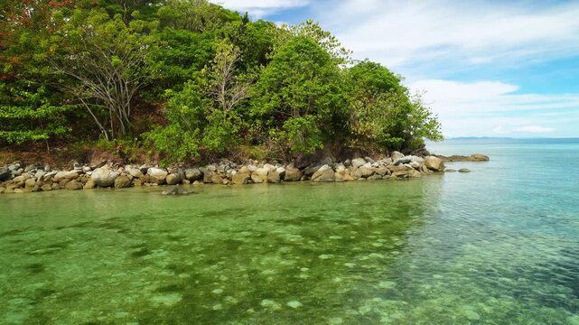 Rocky Islet in Crystal Clear Lagoon
