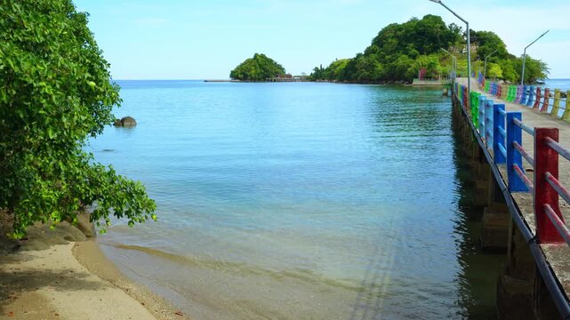 Calm Tropical Bay with Small Islet