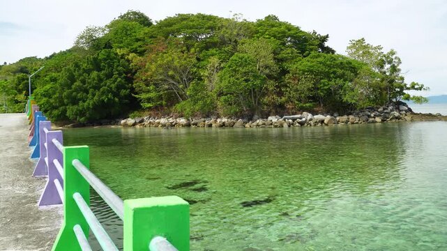 Small Tropical Islet Viewed from Pier