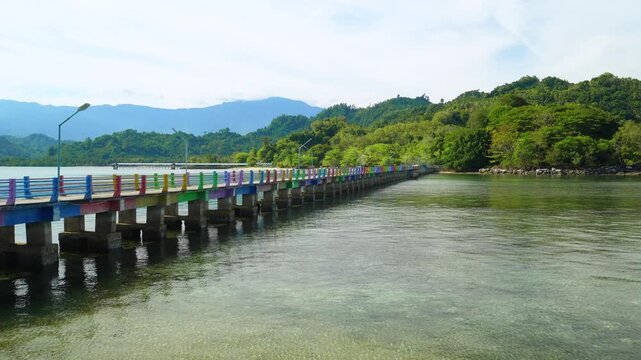 Long Wooden Bridge Across Tropical Bay