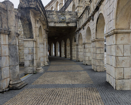 Perspective view of a Roman-style stone colonnade in Macao China