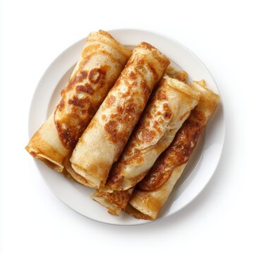 Bangladeshi  patishapta pancakes with sweet coconut and jagger isolated on a white background