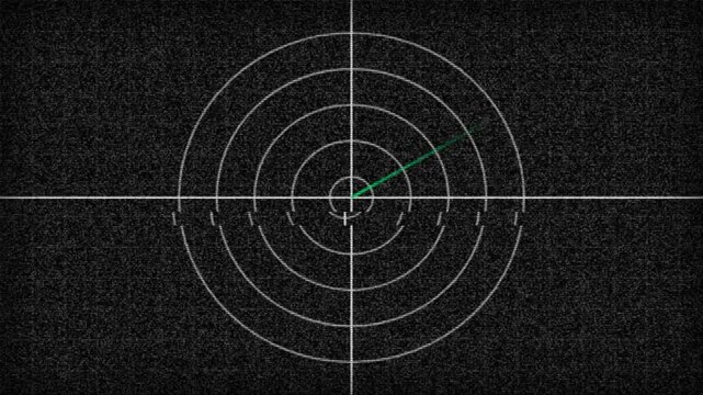 Green radar sweep scanning across concentric circles on dark monitor