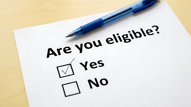 Questionnaire Document Asking Are You Eligible with Yes Checkbox Marked and Blue Pen on Desk