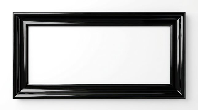 A black frame on a white wall. The frame is empty and ready for a picture or artwork.