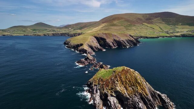 Approach from the ocean toward the cliffs of Dunmore Head