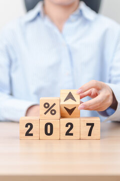 2027 New year with percentage change to UP and Down arrow. Interest rate, GDP, stocks market, financial, deflation and Inflation, mortgage, debt, Loan and Economic Recession