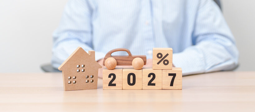 2027 New Year with percentage change to UP and Down arrow with car and Home model. Car loan, Interest rate, real estate, house, Insurance, Financial, Repair, Tax, mortgage and Maintenance